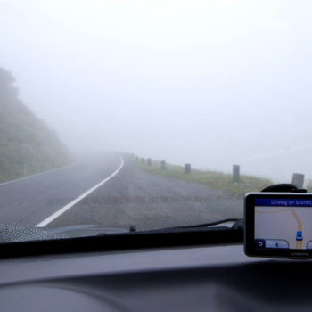 Driving on a foggy road when hiring a car in Austria