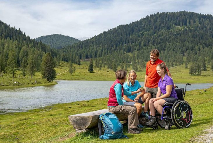 A family with a wheel cahir user in the Austrian Alps